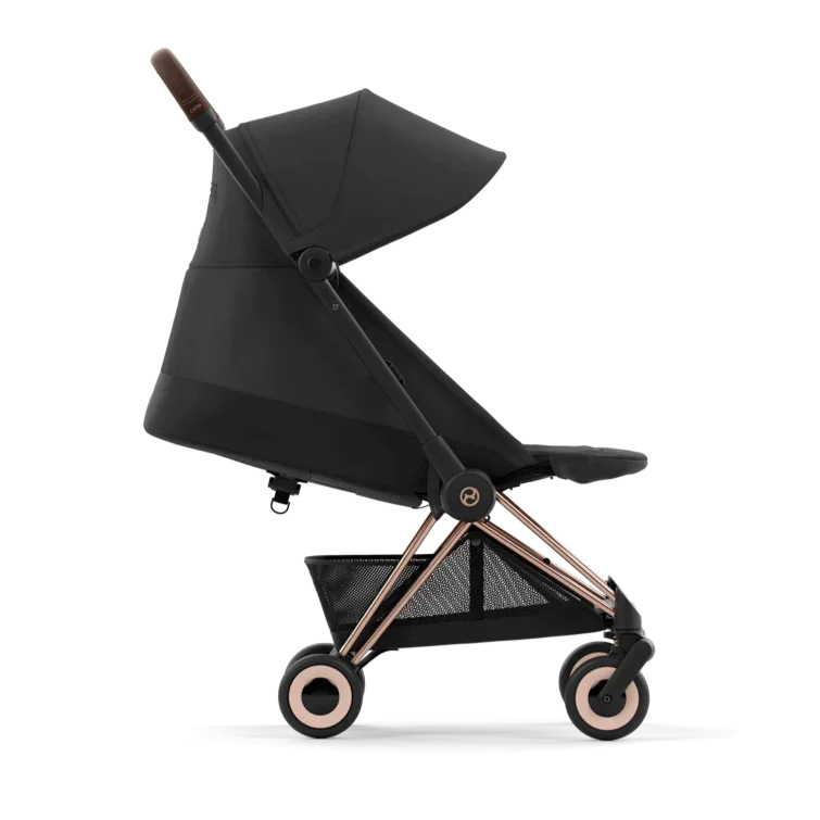 Black stroller with rose gold accents on a white background