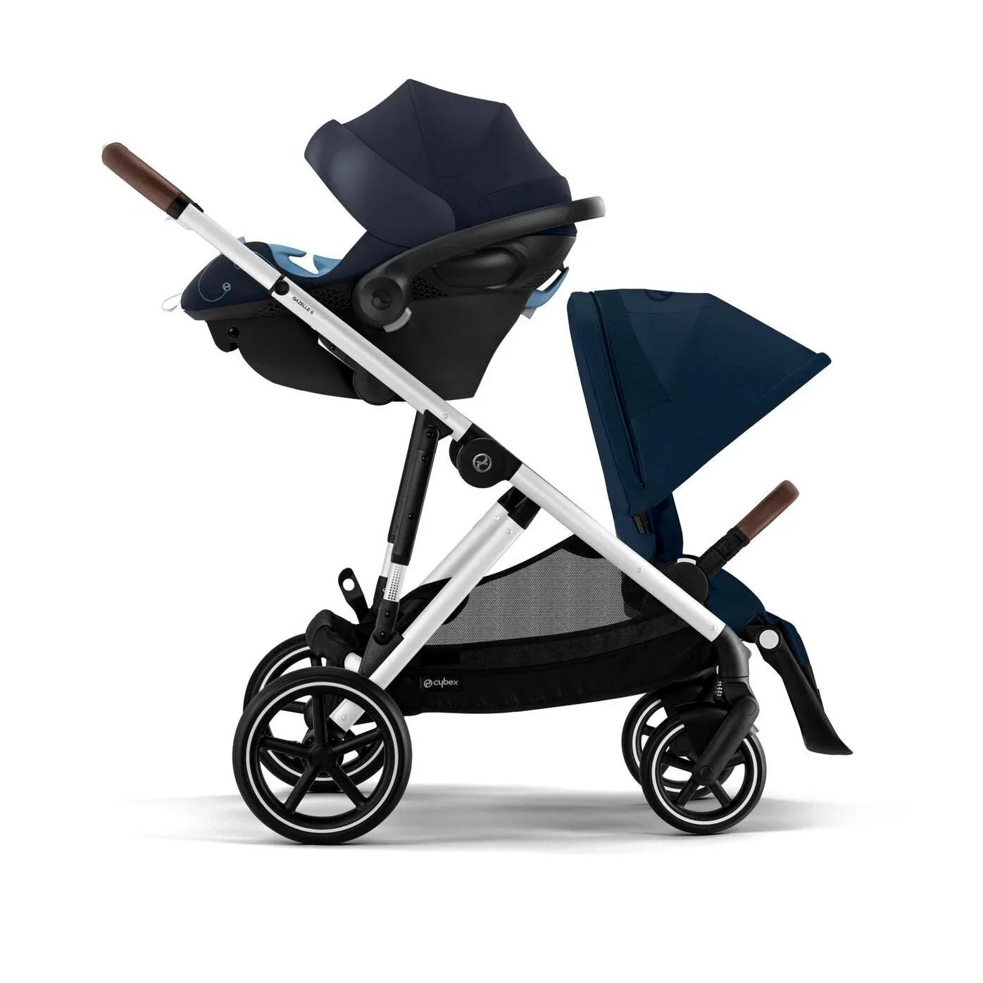 Tandem Baby stroller with navy blue canopy and seat on a white background